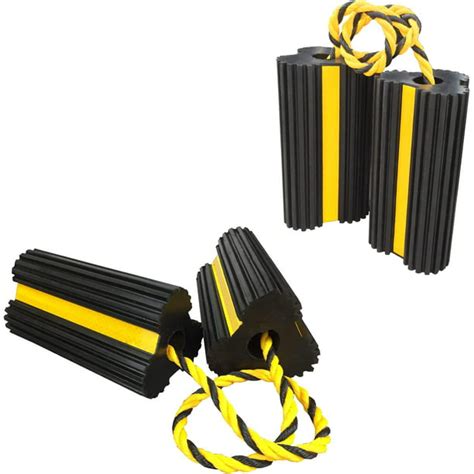 dual yellow wheel chocks with skid steer|long connecting rope chocks.